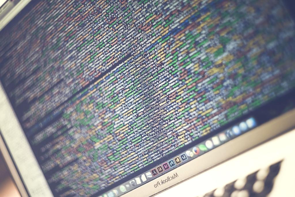 Modern organized office workspace with digital documents and filing system