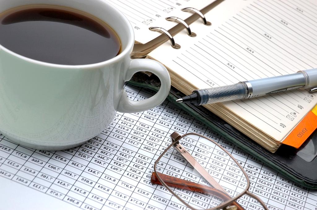 Illustration of pricing plans with charts and documents